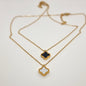 Black & White Reversible Four-Leaf Clover Necklace